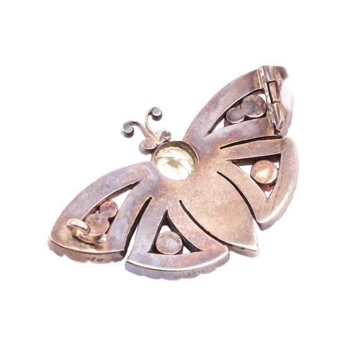 6 - A late Victorian gem-set butterfly brooch, consisting of a circular-cut chrysoberyl thorax and an em... 