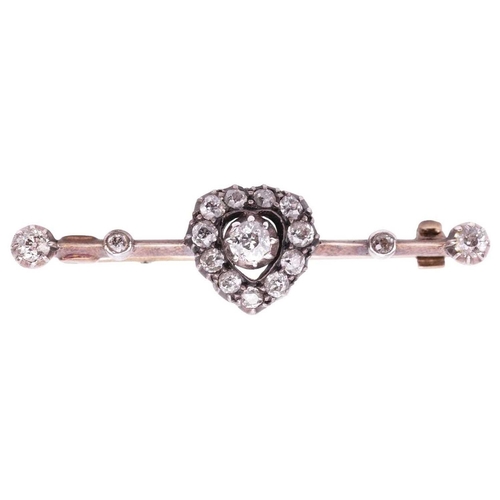 62 - A late Victorian diamond-set heart bar brooch, the heart-shaped cluster centred with a single old-cu... 