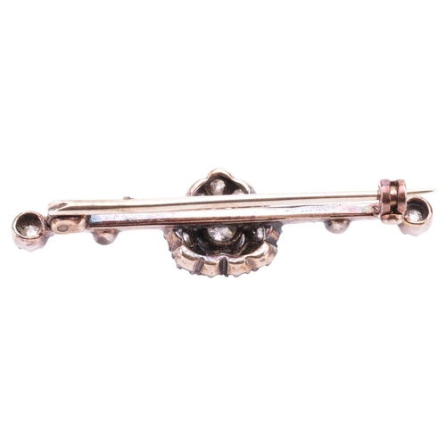 62 - A late Victorian diamond-set heart bar brooch, the heart-shaped cluster centred with a single old-cu... 