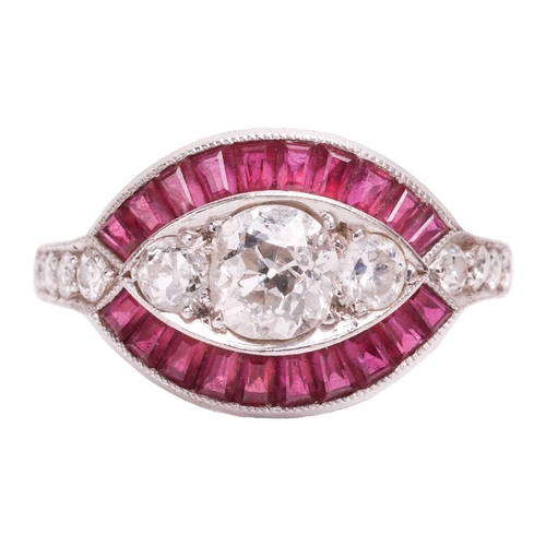 65 - An Art Deco style diamond and ruby-set navette ring, featuring three centrally-set old-cut diamonds,... 