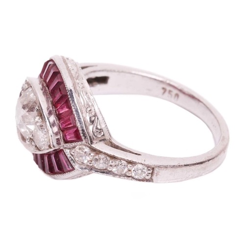 65 - An Art Deco style diamond and ruby-set navette ring, featuring three centrally-set old-cut diamonds,... 