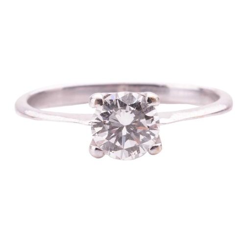 67 - A diamond solitaire ring, featuring a round brilliant-cut diamond of 5.4 mm, with an estimated weigh... 