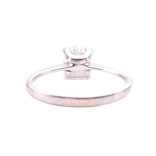 67 - A diamond solitaire ring, featuring a round brilliant-cut diamond of 5.4 mm, with an estimated weigh... 