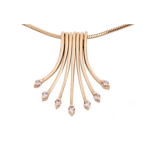 80 - A diamond-set fringe pendant necklace, the snake chain suspending seven graduated drops with diamond... 