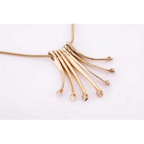 80 - A diamond-set fringe pendant necklace, the snake chain suspending seven graduated drops with diamond... 