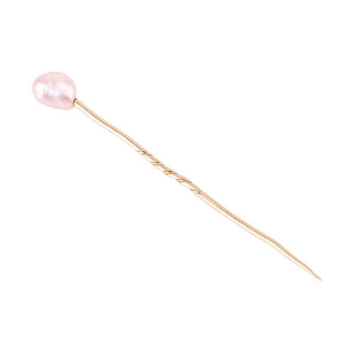 89 - A baroque pearl stick pin, pearl measures approximately 11.3mm x 8.5mm, unmarked yellow metal tests ... 