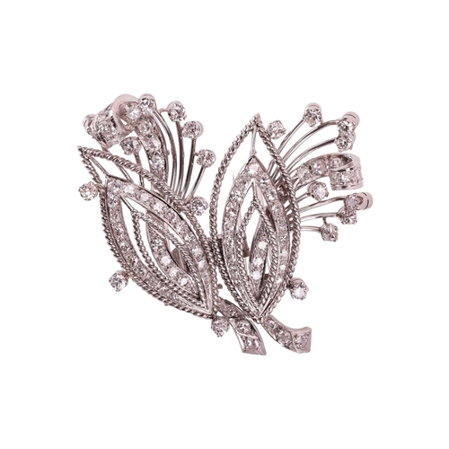 90 - A diamond convertible double-clip spray brooch, each clip with a navette shape motif and spray, set ... 