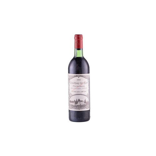 29 - A bottle of Chateau Le Gay Pomerol, 1982, 75cl, with a Chateau Trotanoy Pomerol, 1970, 75cl London c... 