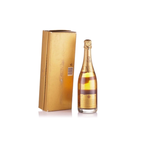 64 - A bottle of Louis Roederer Cristal 1988 in wrapper/box Cellar in London High Fill. Damage to ends of... 