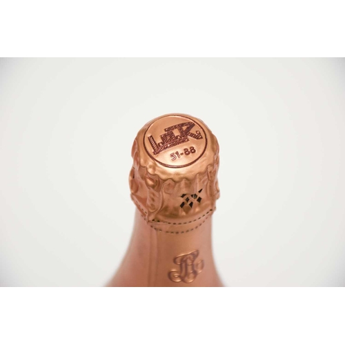 64 - A bottle of Louis Roederer Cristal 1988 in wrapper/box Cellar in London High Fill. Damage to ends of... 