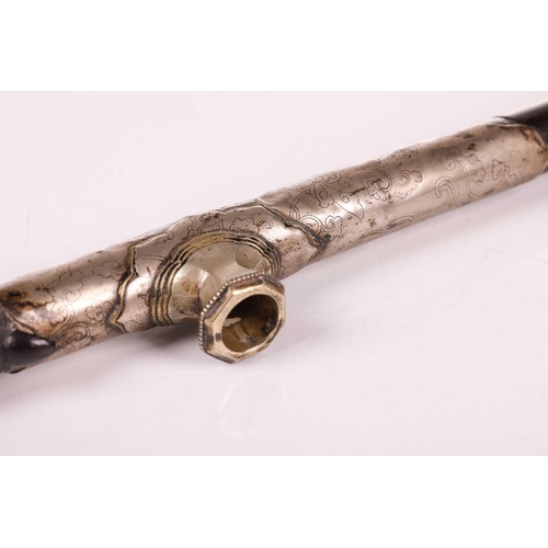 105 - A 19th/20th-century Chinese zitan wood opium pipe with a white jade mouthpiece, paktong saddle and b... 