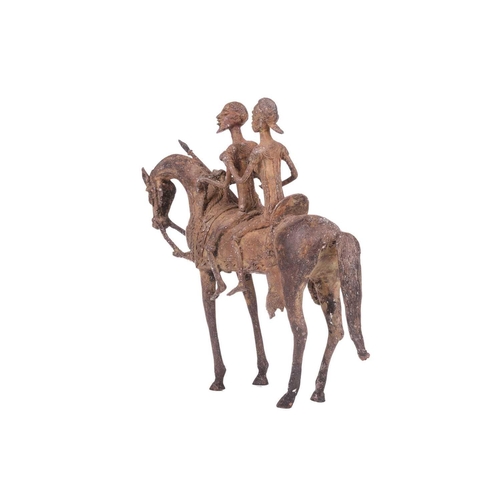 106 - A Dogon copper horse, with two figures, 20th century, 29.5 cm x 31 cm.