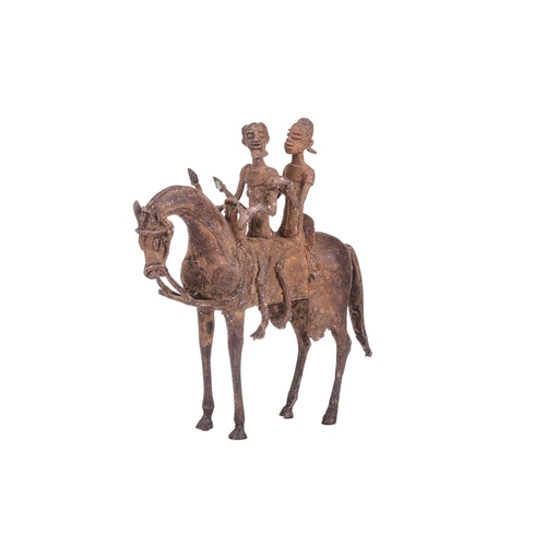 106 - A Dogon copper horse, with two figures, 20th century, 29.5 cm x 31 cm.