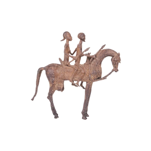 106 - A Dogon copper horse, with two figures, 20th century, 29.5 cm x 31 cm.