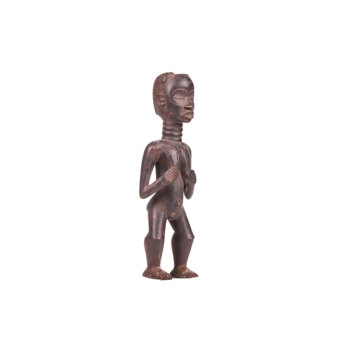 107 - A Dan carved wood fertility standing figure, 20th century, 42 cm high.