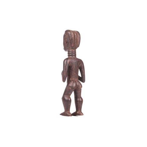 107 - A Dan carved wood fertility standing figure, 20th century, 42 cm high.