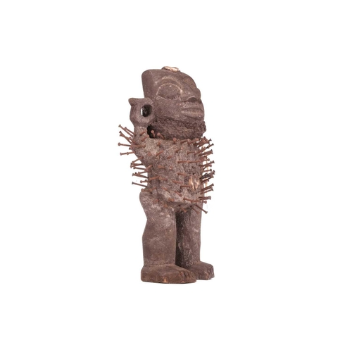 112 - A small Bakongo nail fetish standing figure, 20th century, 22 cm high.