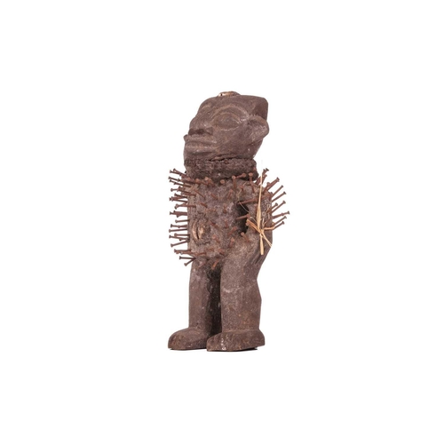 112 - A small Bakongo nail fetish standing figure, 20th century, 22 cm high.