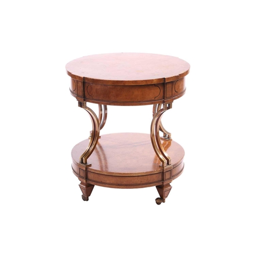 120 - A French Empire-style two-tier drum burr walnut table with concave gilt brass supports over a confor... 