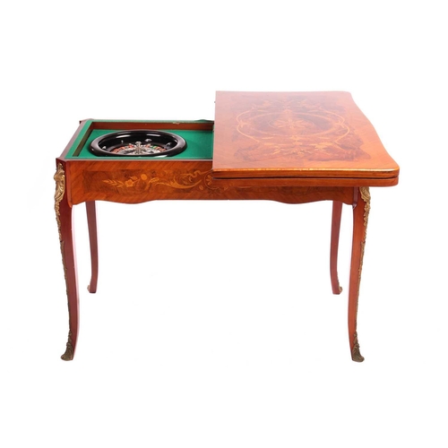 123 - An Italian Dal Negro walnut and marquetry gaming/roulette table, and gaming compendium the fold over... 