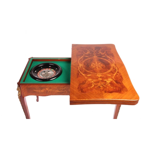 123 - An Italian Dal Negro walnut and marquetry gaming/roulette table, and gaming compendium the fold over... 