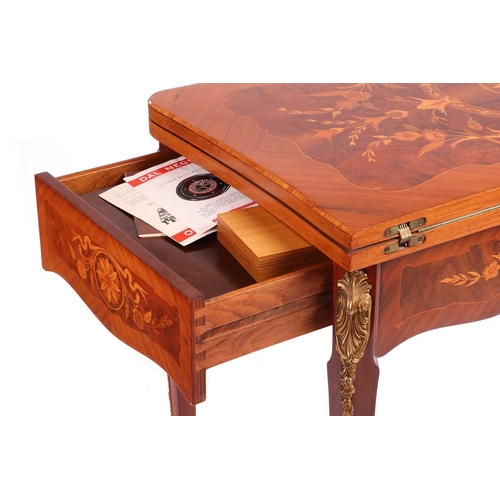 123 - An Italian Dal Negro walnut and marquetry gaming/roulette table, and gaming compendium the fold over... 