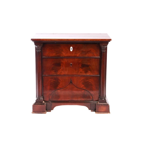 126 - A 19th century Biedermeier or Louis Phillippe flame mahogany pier mirror and commode, the scrolling ... 