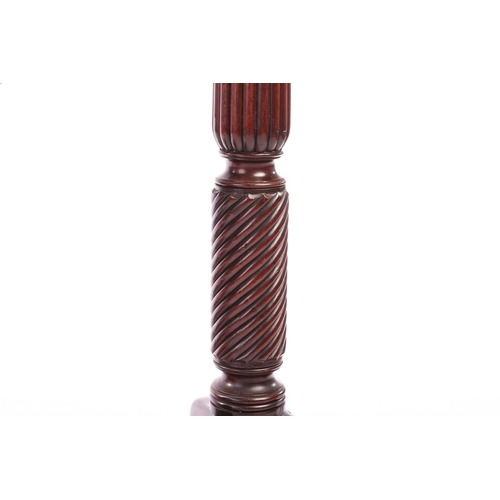 135 - An Edwardian mahogany two-tier pedestal of architectural, form with dentil moulding and fluted colum... 