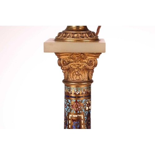 138 - A pair of 19th-century French onyx, gilt metal and champléve enamel oil lamp bases of Corinthian col... 