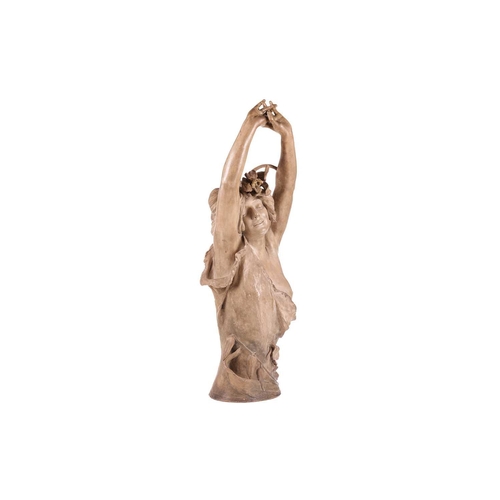 165 - A large Art Nouveau earthenware figure, in the manner of Goldscheider, formed as a semi-nude female ... 