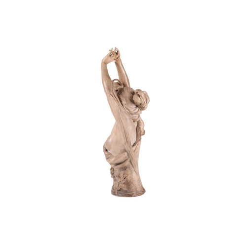 165 - A large Art Nouveau earthenware figure, in the manner of Goldscheider, formed as a semi-nude female ... 