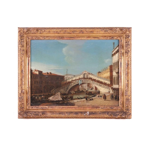 24 - Venetian School (18th Century), A pair of Venetian landscapes: The Rialto Bridge from the south and ... 