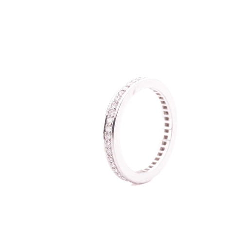 101 - A diamond-set full eternity ring, featuring round brilliant diamonds, with an estimated total carat ... 