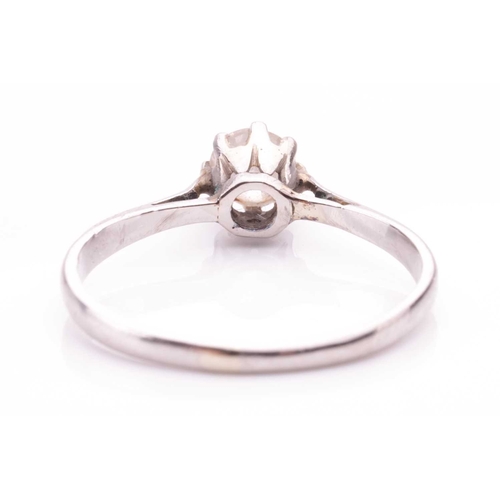 103 - A diamond solitaire ring, set with a round old-cut diamond with an estimated weight of 0.30ct, in a ... 