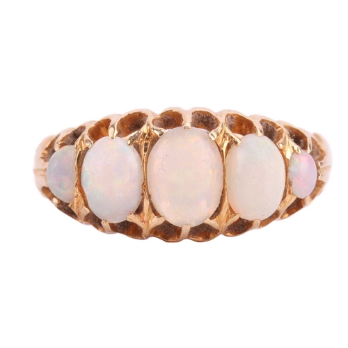 107 - An early 20th-century opal half-hoop ring in 18ct gold, featuring five graduated cabochon opals, of ... 