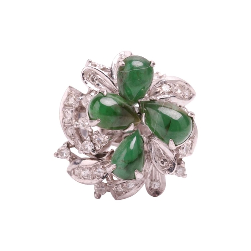 109 - A jadeite and diamond cluster pendant and matching ring, of tiered foliate design, the oval and pear... 