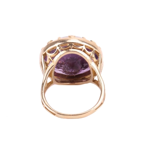 114 - An amethyst fleur-de-lis cocktail ring, the fleur-de-lis emblem set with rose cut diamonds and mount... 