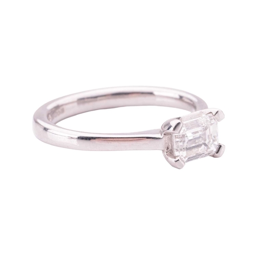 115 - A diamond solitaire ring, featuring an emerald-cut diamond, with an estimated carat, colour and clar... 