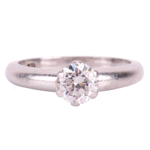 117 - A diamond solitaire ring, with a round brilliant cut diamond measuring approximately 5.1mm, with an ... 