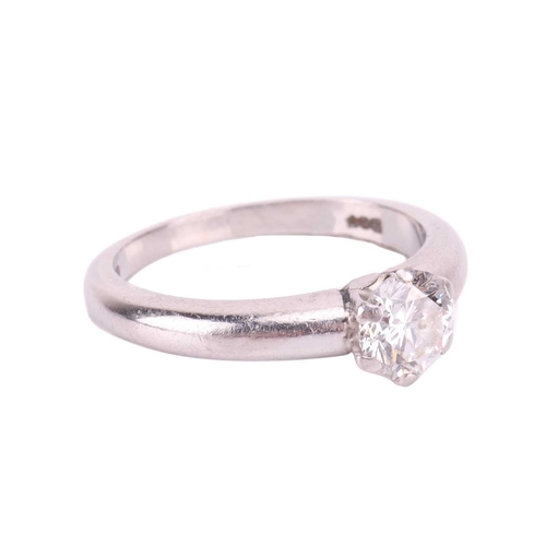 117 - A diamond solitaire ring, with a round brilliant cut diamond measuring approximately 5.1mm, with an ... 