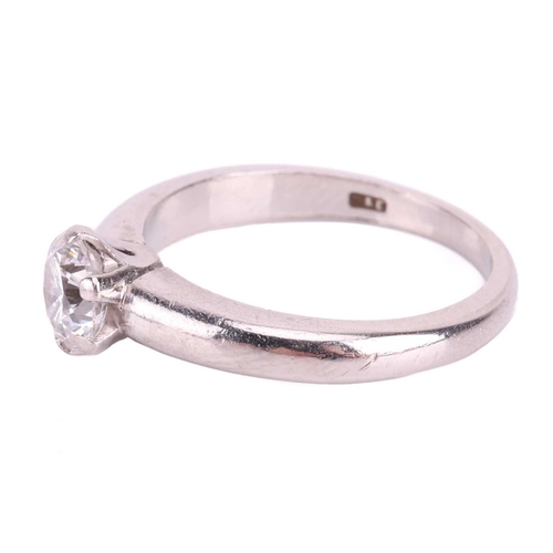 117 - A diamond solitaire ring, with a round brilliant cut diamond measuring approximately 5.1mm, with an ... 