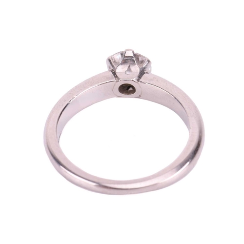 117 - A diamond solitaire ring, with a round brilliant cut diamond measuring approximately 5.1mm, with an ... 