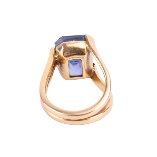 137 - An unheated colour-change Ceylon sapphire solitaire ring, featuring an octagonal step-cut sapphire o... 