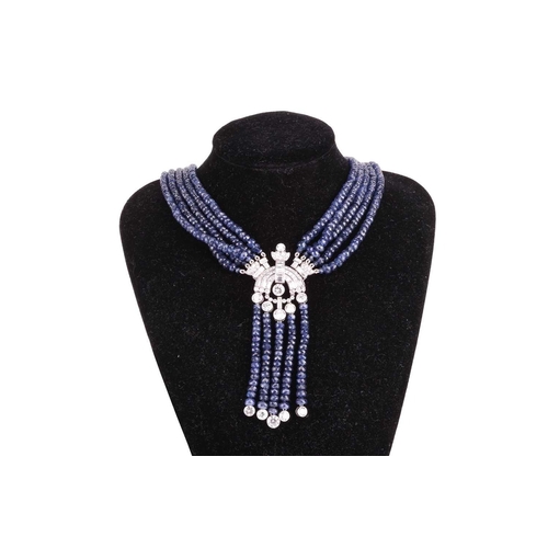 139 - An Art Deco style beaded sapphire and diamond sautoir necklace, composed of five strands of faceted ... 