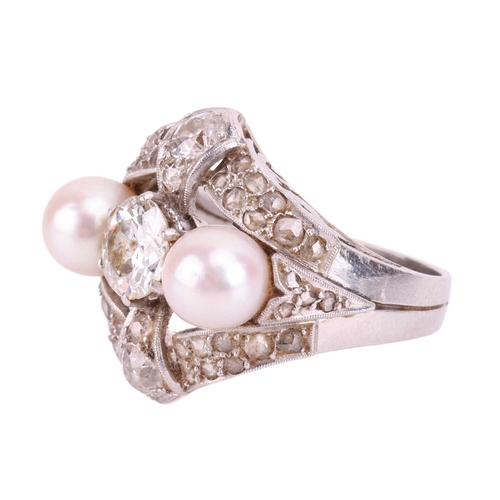 142 - An old-cut diamond and pearl cocktail ring, the principal old European-cut diamond measuring approxi... 