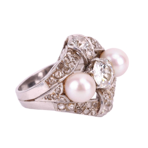 142 - An old-cut diamond and pearl cocktail ring, the principal old European-cut diamond measuring approxi... 