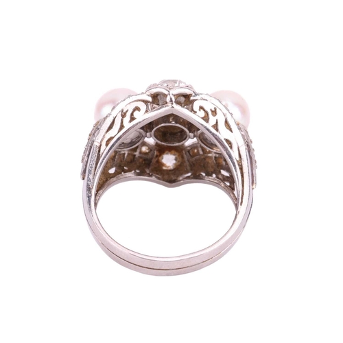 142 - An old-cut diamond and pearl cocktail ring, the principal old European-cut diamond measuring approxi... 