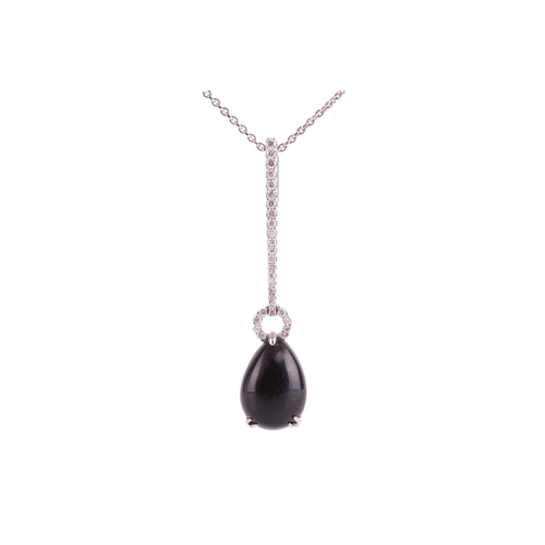 17 - A Whitby jet and diamond drop pendant on chain, featuring a teardrop-shaped jet cabochon of 13.0 x 9... 