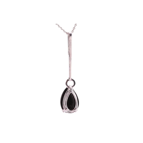 17 - A Whitby jet and diamond drop pendant on chain, featuring a teardrop-shaped jet cabochon of 13.0 x 9... 