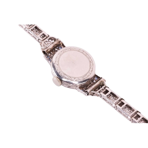 175 - A circa 1925 platinum dress watch with sapphires and diamonds, featuring a Swiss Made Ethic W. C han... 